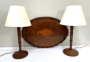 A George III style mahogany oval tea tray, 19th century, with inlaid shell; also a pair of turned