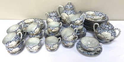 An attractive Japanese eggshell porcelain tea service, early 20th century, decorated in blue and