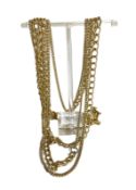 Assorted yellow and white metal jewellery, including two chains, assorted earrings, a large locket