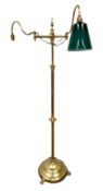 A vintage brass adjustable floor standing Library standard lamp, with two arms; also a Corinthian