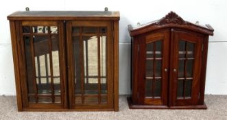 A small wall mounted vitrine/ display cabinet, with mirrored back; and another similar smaller