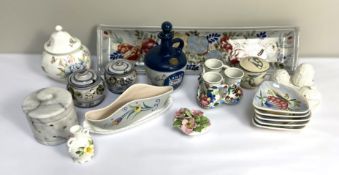 Assorted decorative ceramics, including a set of five scallop decorated dishes, and a white leaf