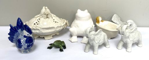 Collection of ceramic animals. Including a pair of novelty elephants, a seated frog, a dove, and