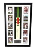 CRICKET: A cased and signed cricket bat, bears signature for Andrew Strauss, surrounded with
