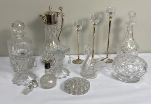 A selection of table glassware, including a silver plate mounted claret jug, a pair of candlestick