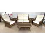 A large modern Colonial style Rattan Conservatory suite, comprising a two seat settee, two