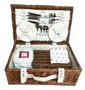 Picnic basket set, by Joules, with wicker basket and fitted interior for four place settings