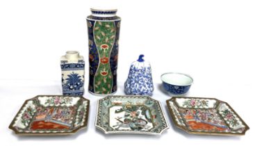 A selection of modern Chinese porcelain, including a blue and white rice bowl, inset with