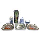 A selection of modern Chinese porcelain, including a blue and white rice bowl, inset with