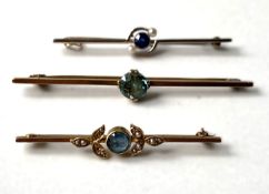 Three vintage bar brooches, two with round cut ‘sapphires’ and pearls, one marked indistinctly,