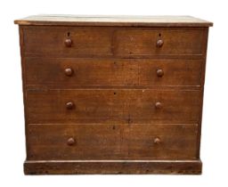 A small vintage oak chest of drawers, with two short and three long drawers, on a plinth base,