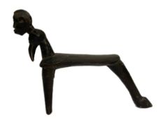 An unusual African Lobi Zoomorphic stool, probably Burkina Faso, 20th Century, set on three legs,