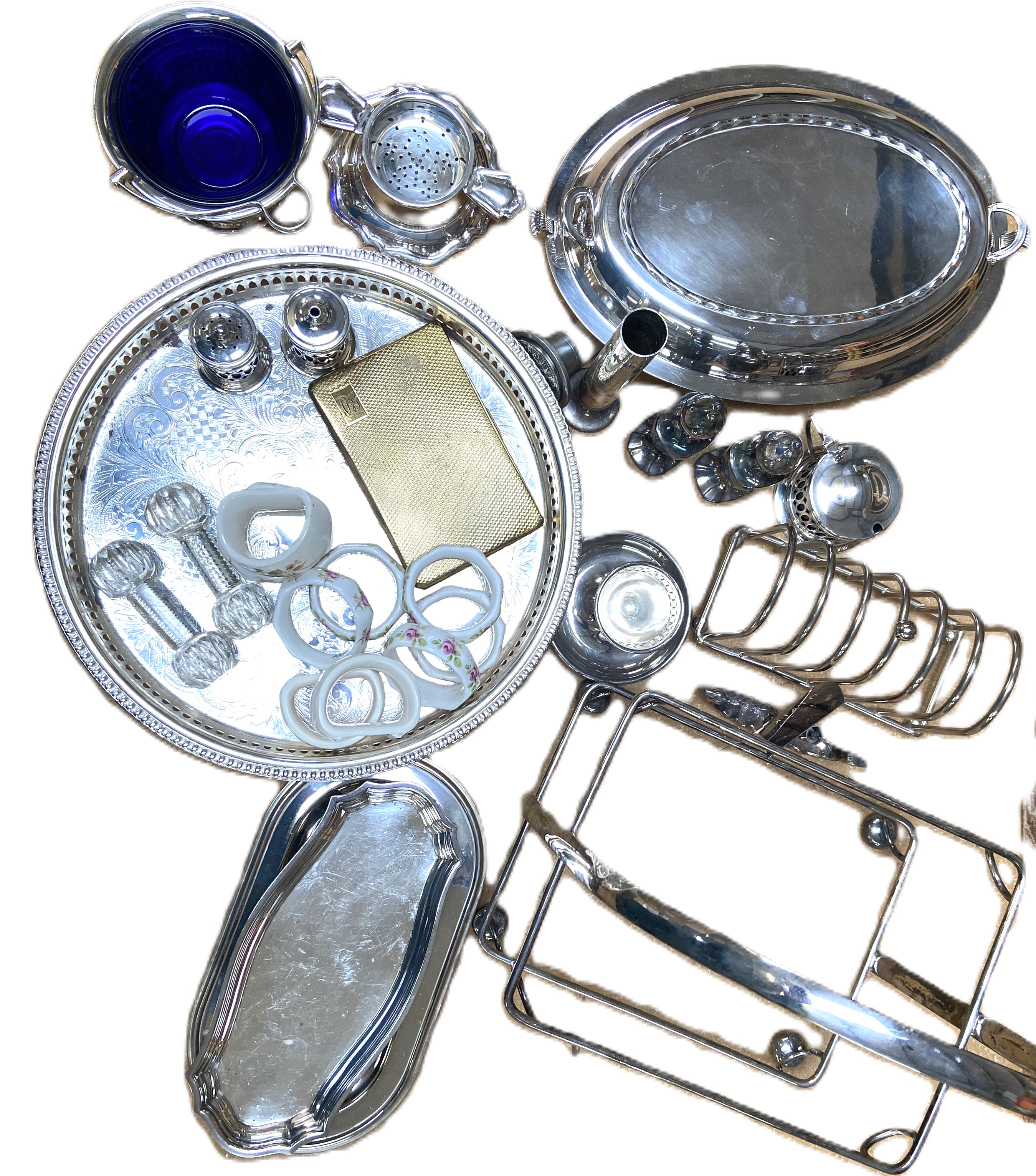 Assorted silver plate, including a toast rack, assorted condiments, a two tier tray etc. (a lot)
