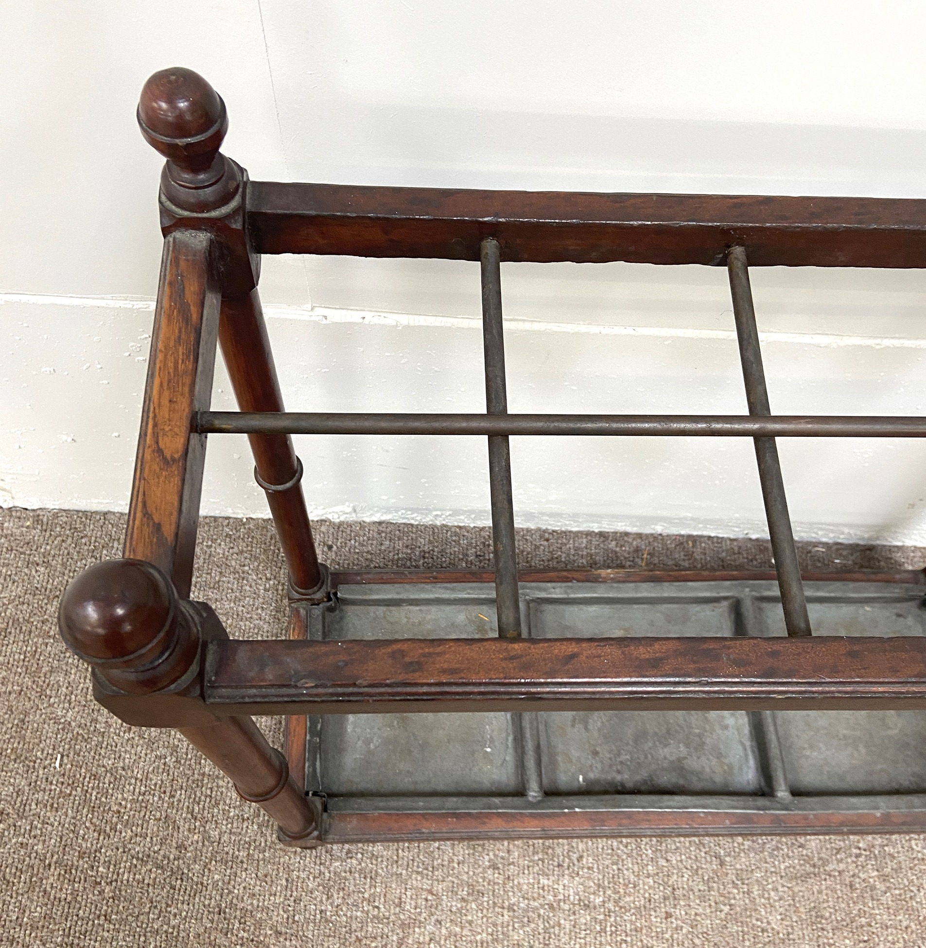 An Edwardian stick stand, with turned finials, dividers and a drip tray, within turned supports; and - Image 3 of 8