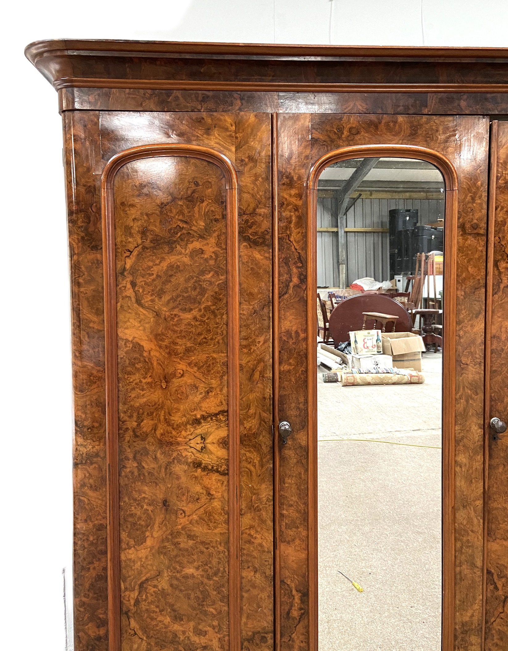 A mid Victorian burr walnut veneered triple wardrobe, circa 1870, with a central arch moulded - Image 3 of 6