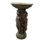 A modern composition stone bird bath, the dished top supported by the Three Graces, 40cm diameter