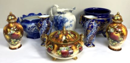 A pair of Worcester style baluster vases, decorated with fruit, together with a group of assorted