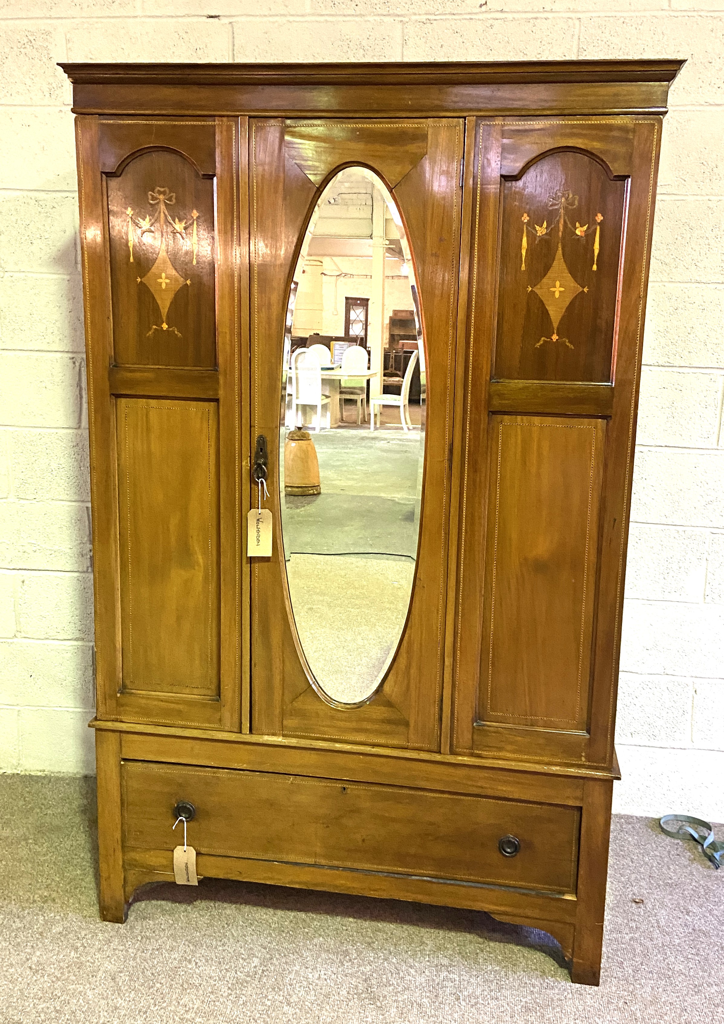 An Edwardian mahogany single door wardrobe with oval mirrored door - Image 2 of 3