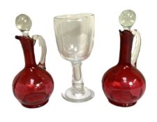A good pair of vintage Ruby glass ewers, together with a very large glass goblet, probably mid