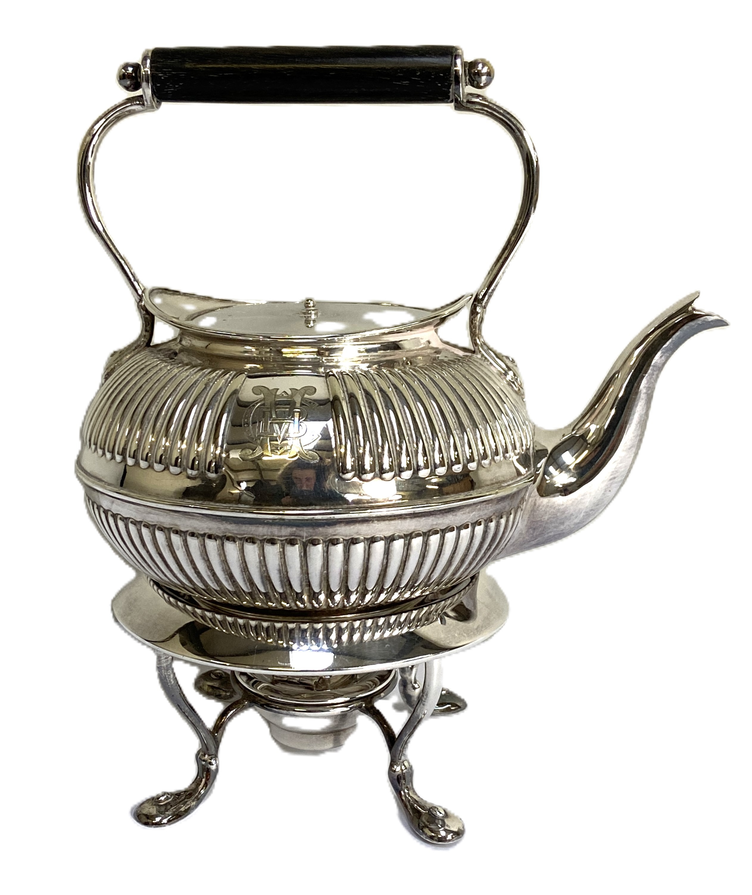Assorted silver plate, including a Georgian style tea kettle on stand, a pair of table decorations