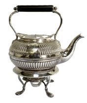 Assorted silver plate, including a Georgian style tea kettle on stand, a pair of table decorations