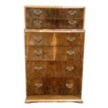 A vintage burr walnut chest of drawers, with six graduated and stepped drawers, 131cm high