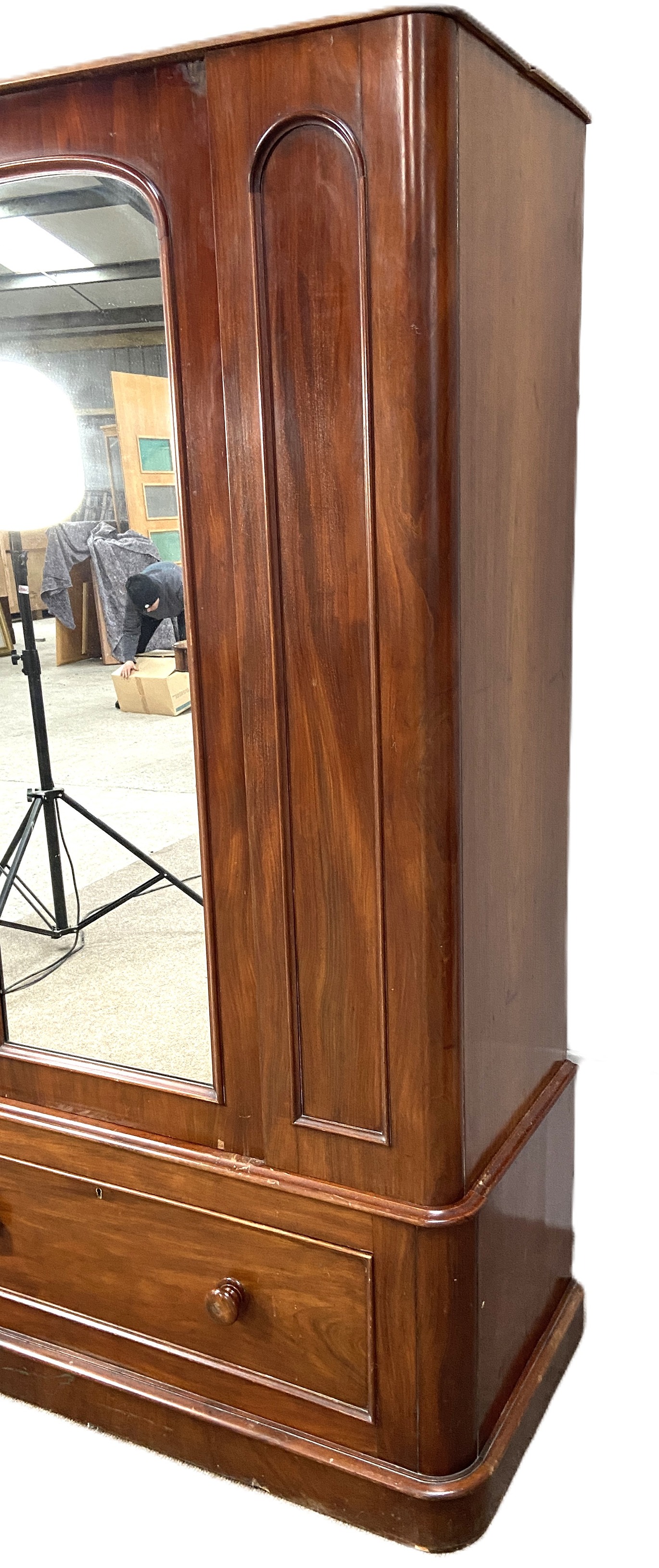 A Victorian mahogany single warbrobe, with mirrored arched door over a long drawer. (lacks - Image 6 of 6