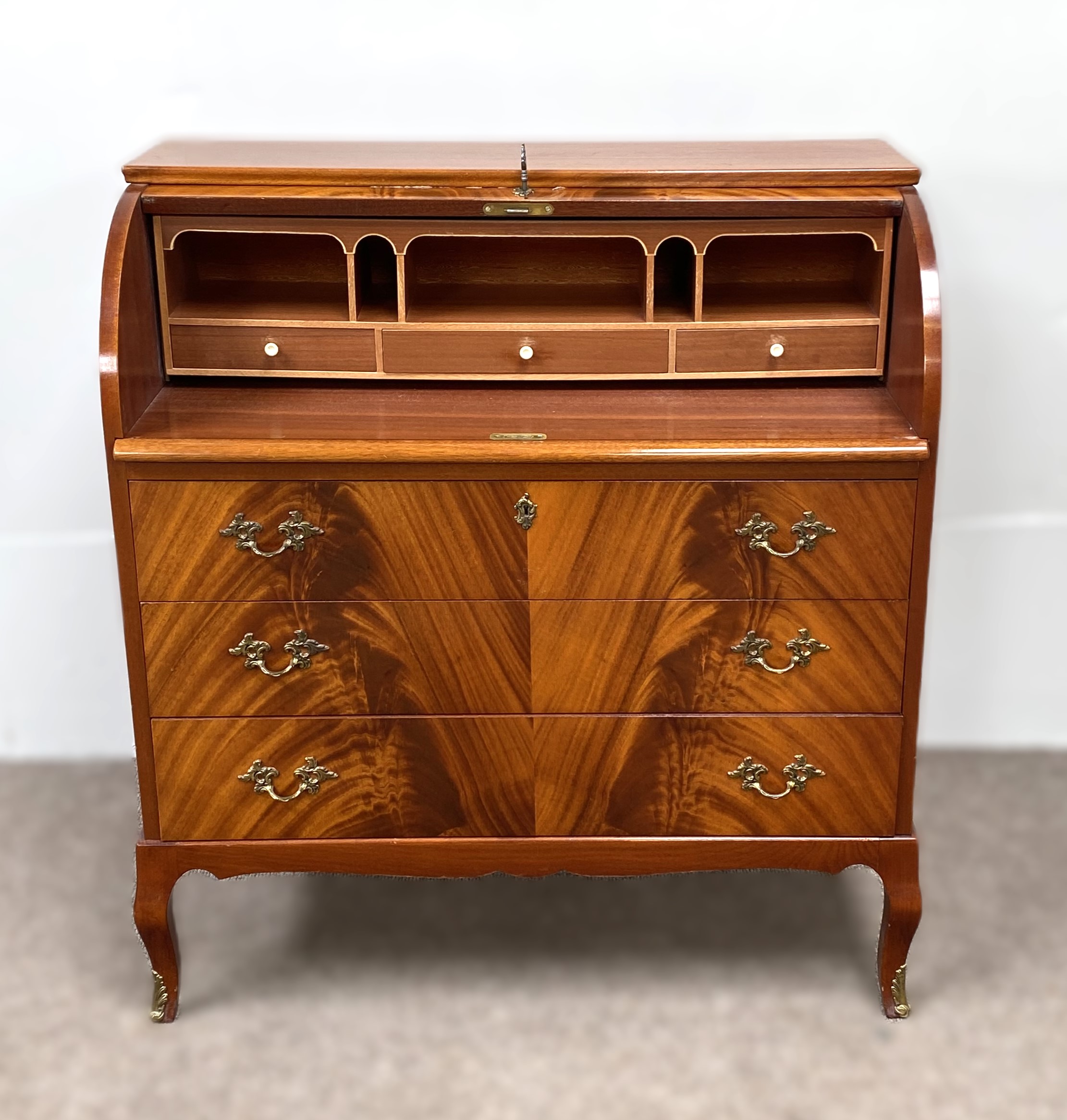 A modern reproduction mahogany veneered cylinder bureau, with roll top and arrangement of niches and - Image 3 of 5