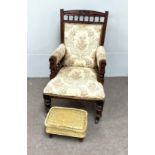 A late Victorian mahogany easy chair, together with a small footstool