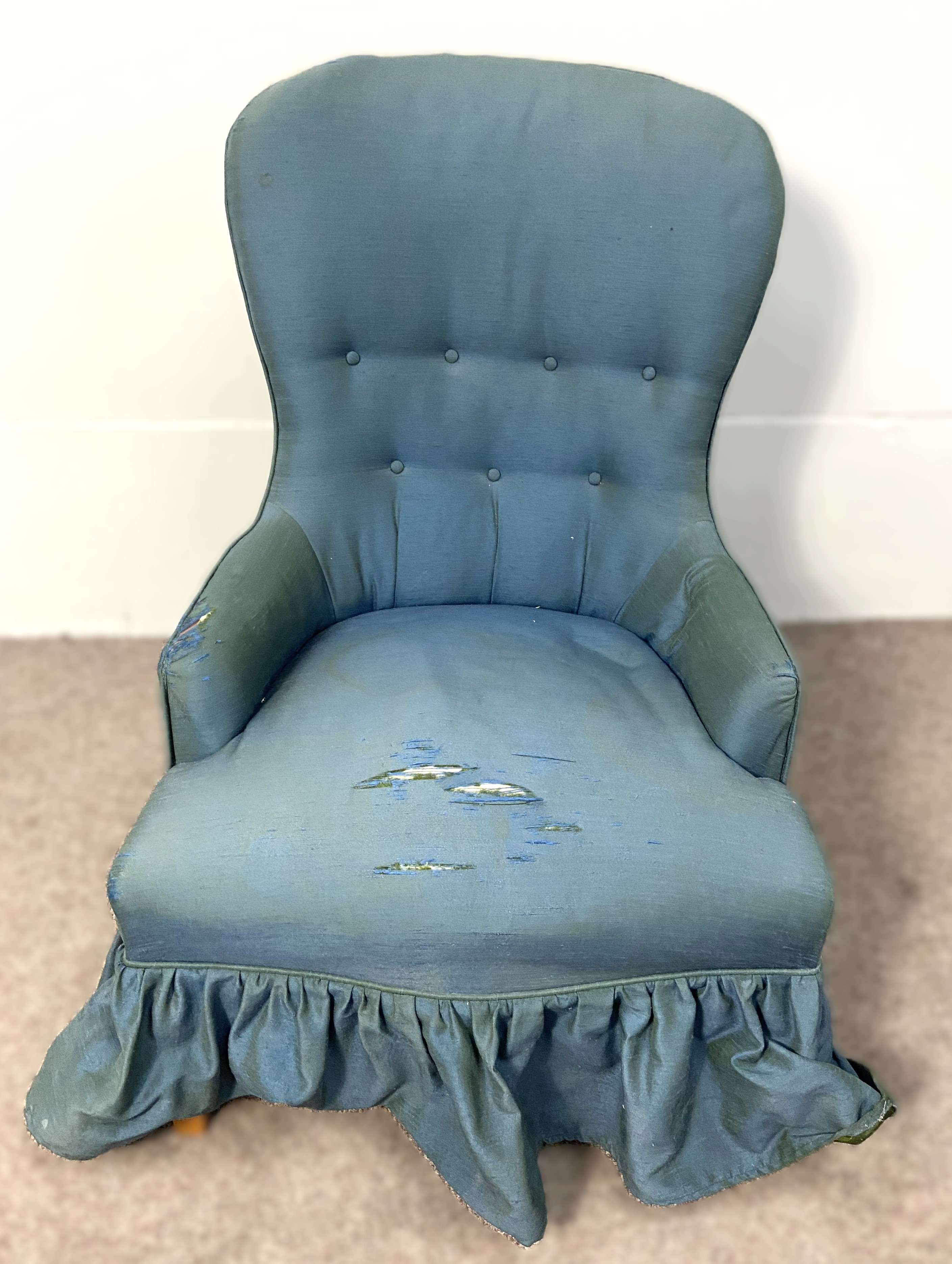 A small Victorian spoonback button upholstered bedroom armchair, currently upholstered in blue;