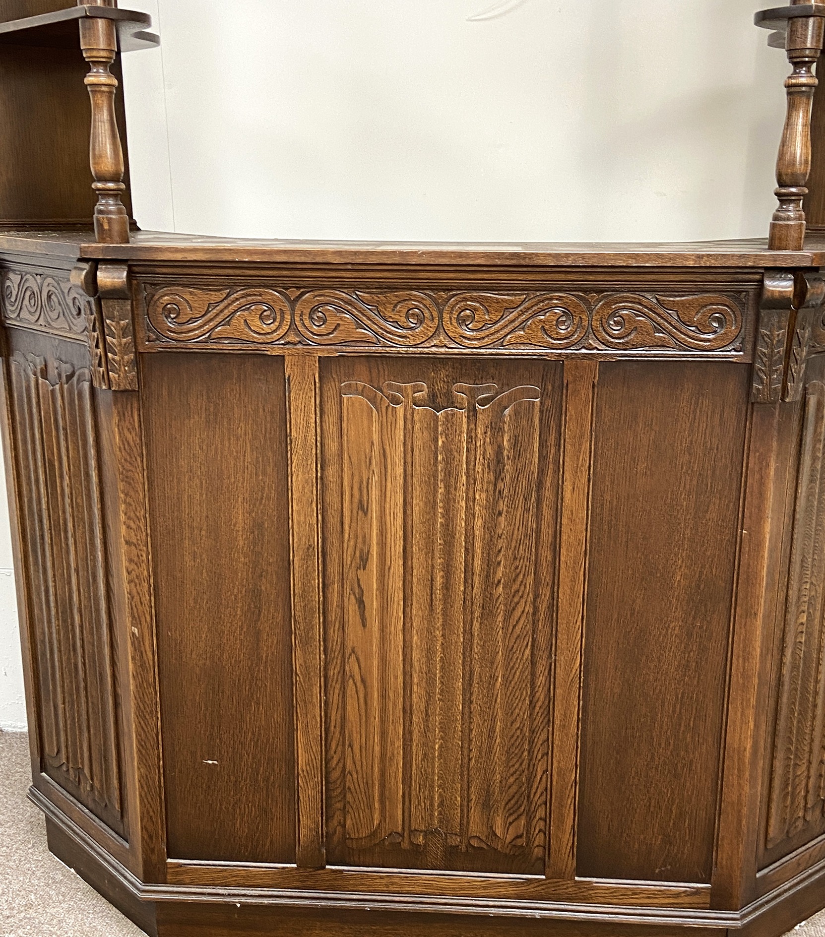 A vintage oak Jacobean style bar, mid 20th century, with canted sides and arched cornice over the - Image 4 of 5