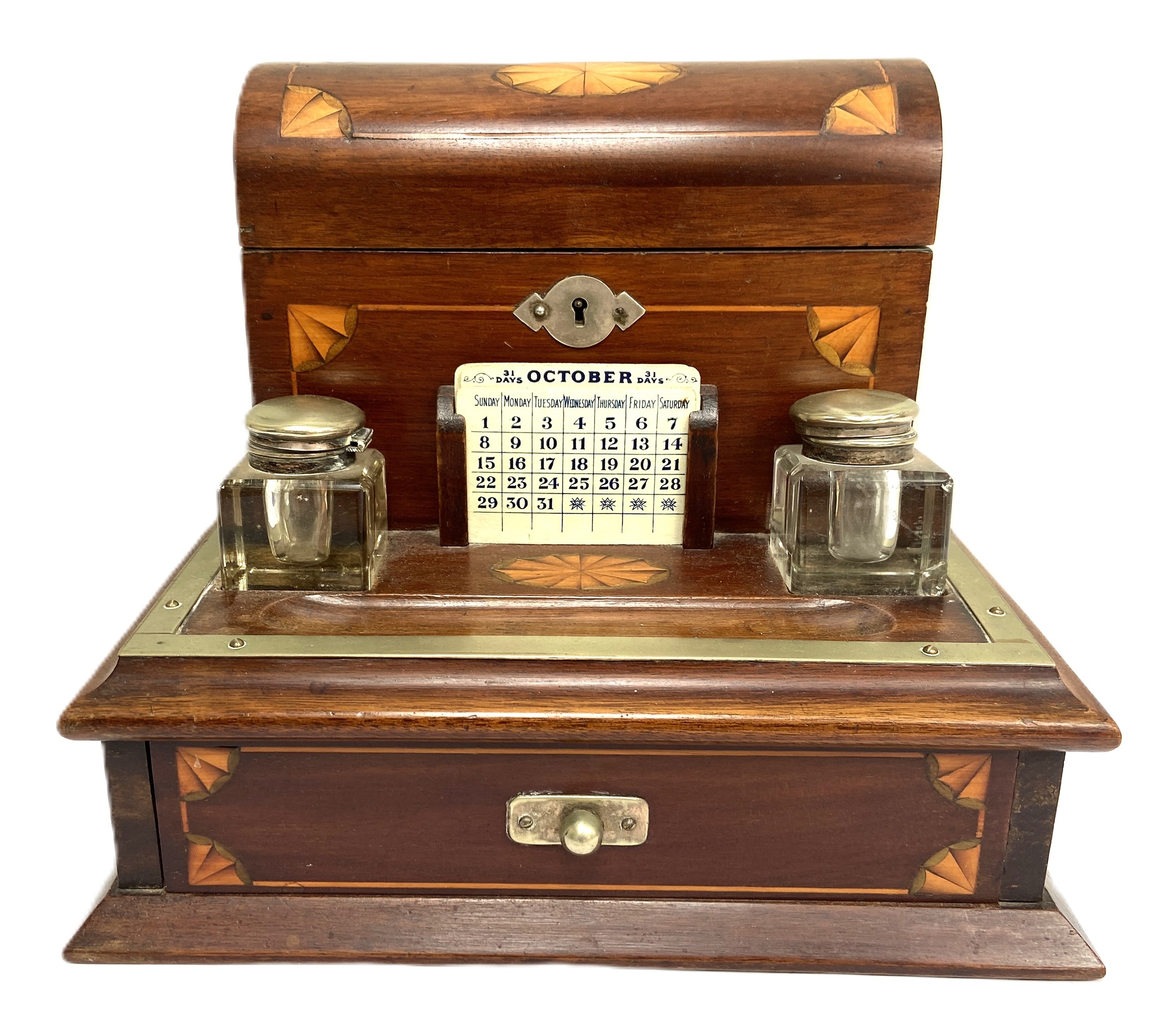 A late Victorian mahogany desktop stationary / inkstand, late 19th century, with an inlaid domed