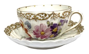 A Dresden porcelain part tea service, decorated with flowers, including a tray and other similar