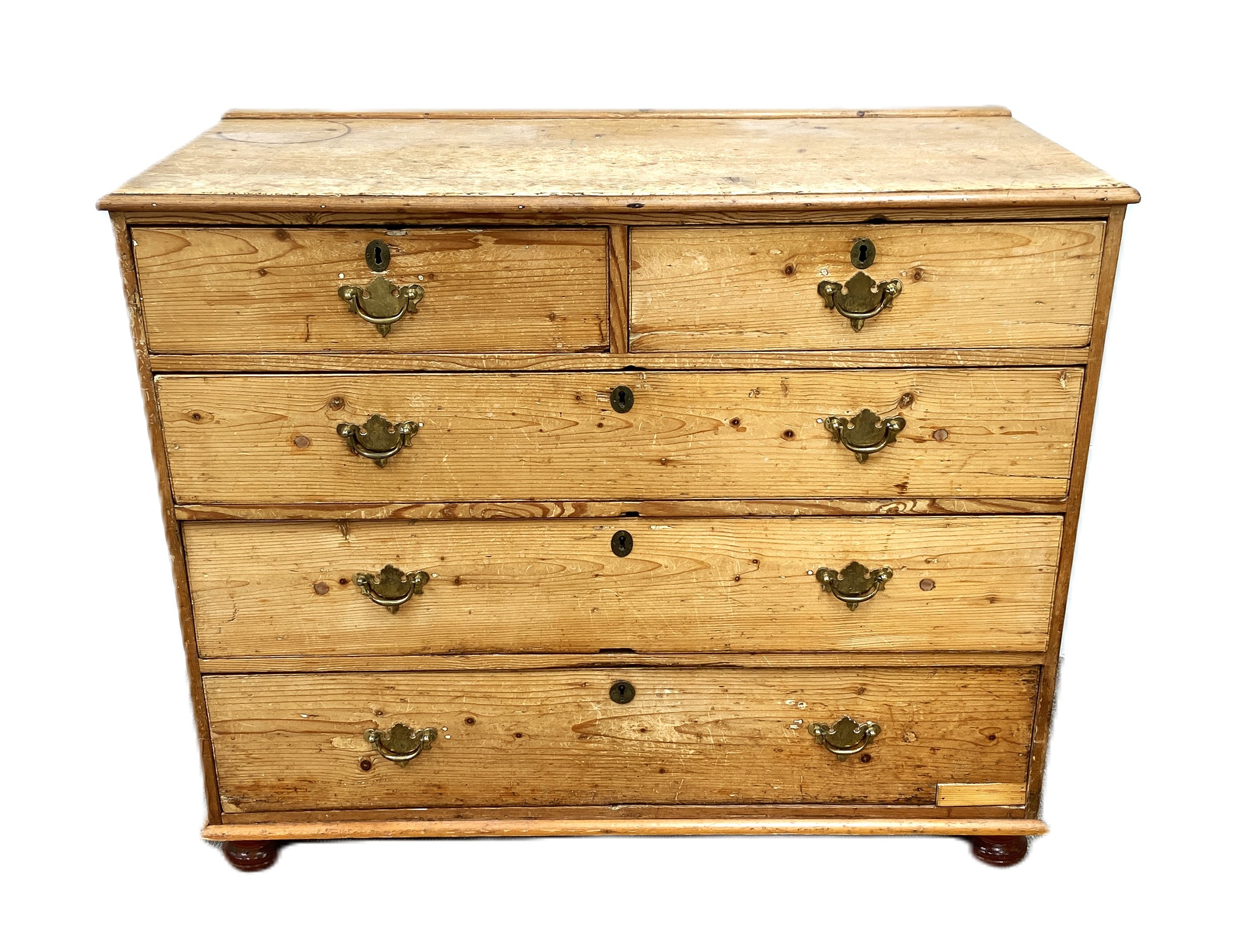 A vintage stripped pine chest of drawers, with two short and three long drawers, 90cm high, 119cm