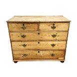 A vintage stripped pine chest of drawers, with two short and three long drawers, 90cm high, 119cm
