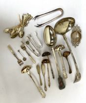 Assorted silver and silver plated flatware, including a plated fiddle pattern soup ladle and