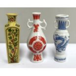 A large collection of miniature vases and ornaments, including a flower encrusted slipper, various