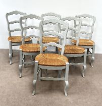A set of six grey painted rush seated dining chairs, with shaped ladder backs (6)