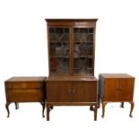 A George III style mahogany bookcase, with a pair of glazed doors over a two door cabinet, 178cm