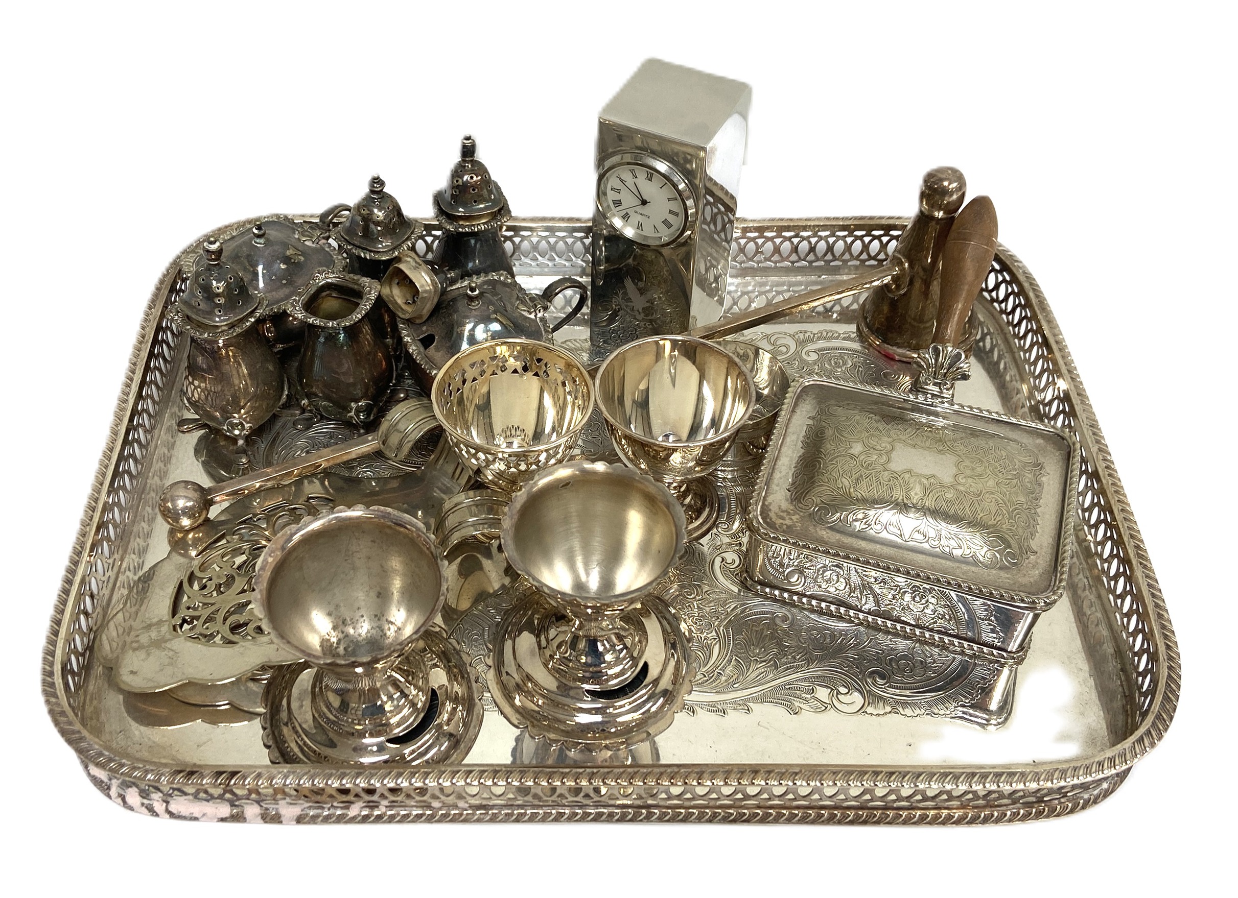 Assorted silver plate and related metalware, including a candle sniffer, various condiments, egg
