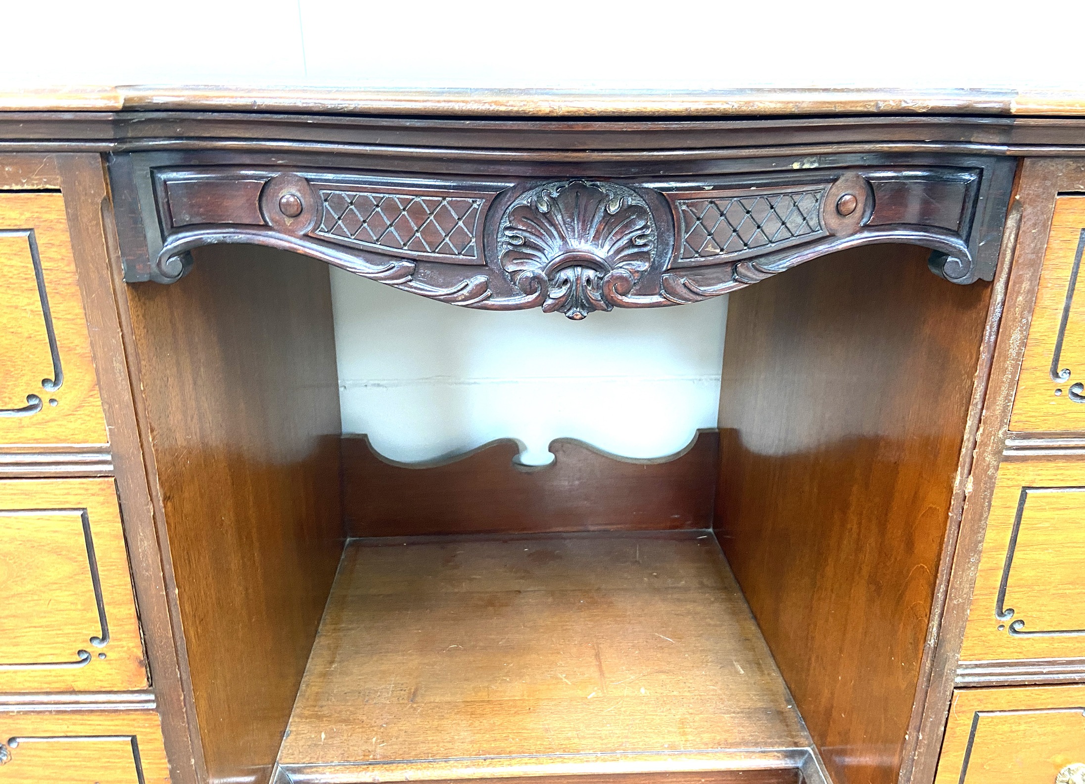 A late Victorian mahogany kneehole desk, with shaped and moulded oblong top over a footwell and - Image 3 of 8