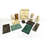 A selection of Grand Tour style Greek reproduction ornaments, including a relief panel of a horse