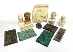 A selection of Grand Tour style Greek reproduction ornaments, including a relief panel of a horse