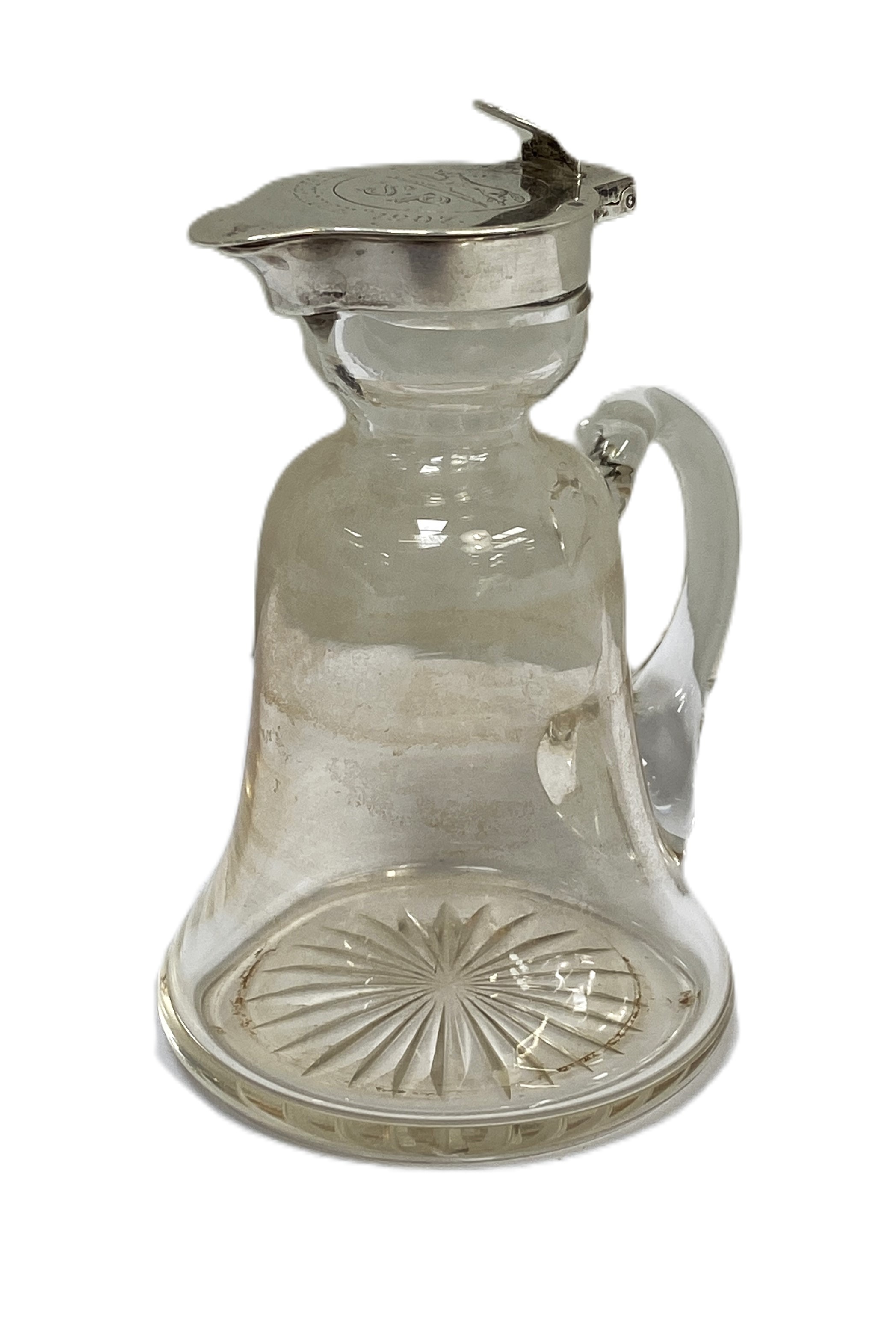 A silver mounted whisky tot, hallmarked London 1902, the top with inscription ‘SP Frangrance