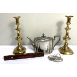 A pair of brass ejector candlesticks, together with a pewter teapot, a Smallwood brass faced