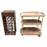 An Ercol ash wood three tier serving trolley, 71cm wide; also an 18 bottle wine rack, with corkscrew