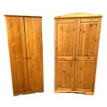 Two modern pine veneered wardrobes, both with two panelled doors, 180cm high (2)