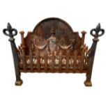 A vintage cast iron fire grate, with integral Adam style arched fire-back and fleur de lys finials