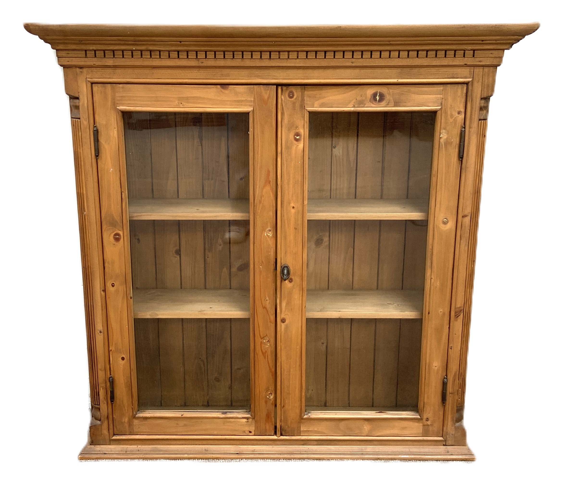 A Georgian style pine display case, modern, with two glazed doors opening to two shelves