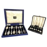 A group of assorted cased silver and silver plated flatware, including two cased sets of twelve